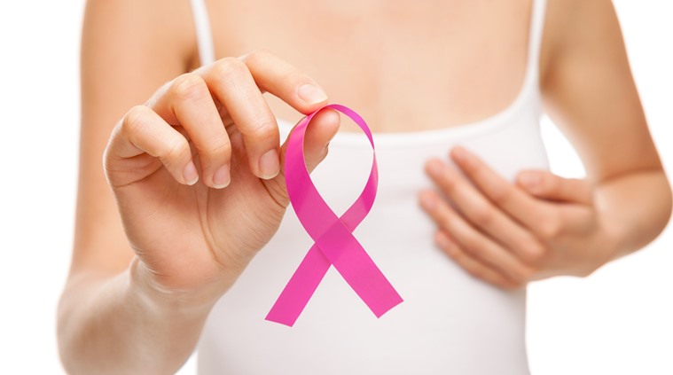 Woman with breast cancer awareness ribbo