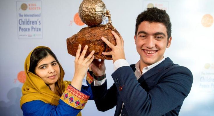 Mohamad Al Jounde, 16, is awarded the 2017 International Children's Peace Prize, by Malala Yousafzai, the youngest recipient of the Nobel Peace Prize,
