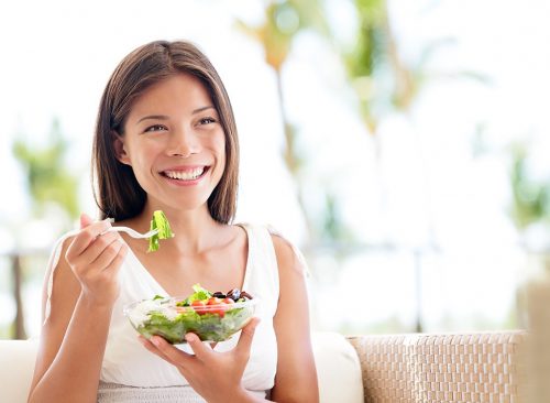 -woman-eating-salad-